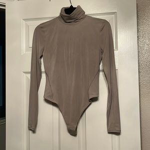 Lululemon Women’s size small body suit